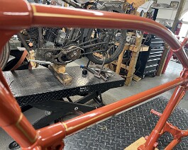 We have begun adding the pin striping to the frame.